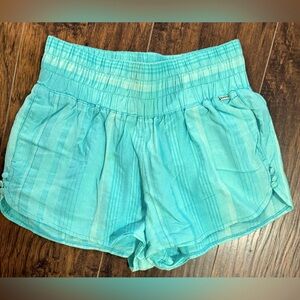Aqua colors/w stripes shorts. Elastic waistband. Side pockets. Lightweight.